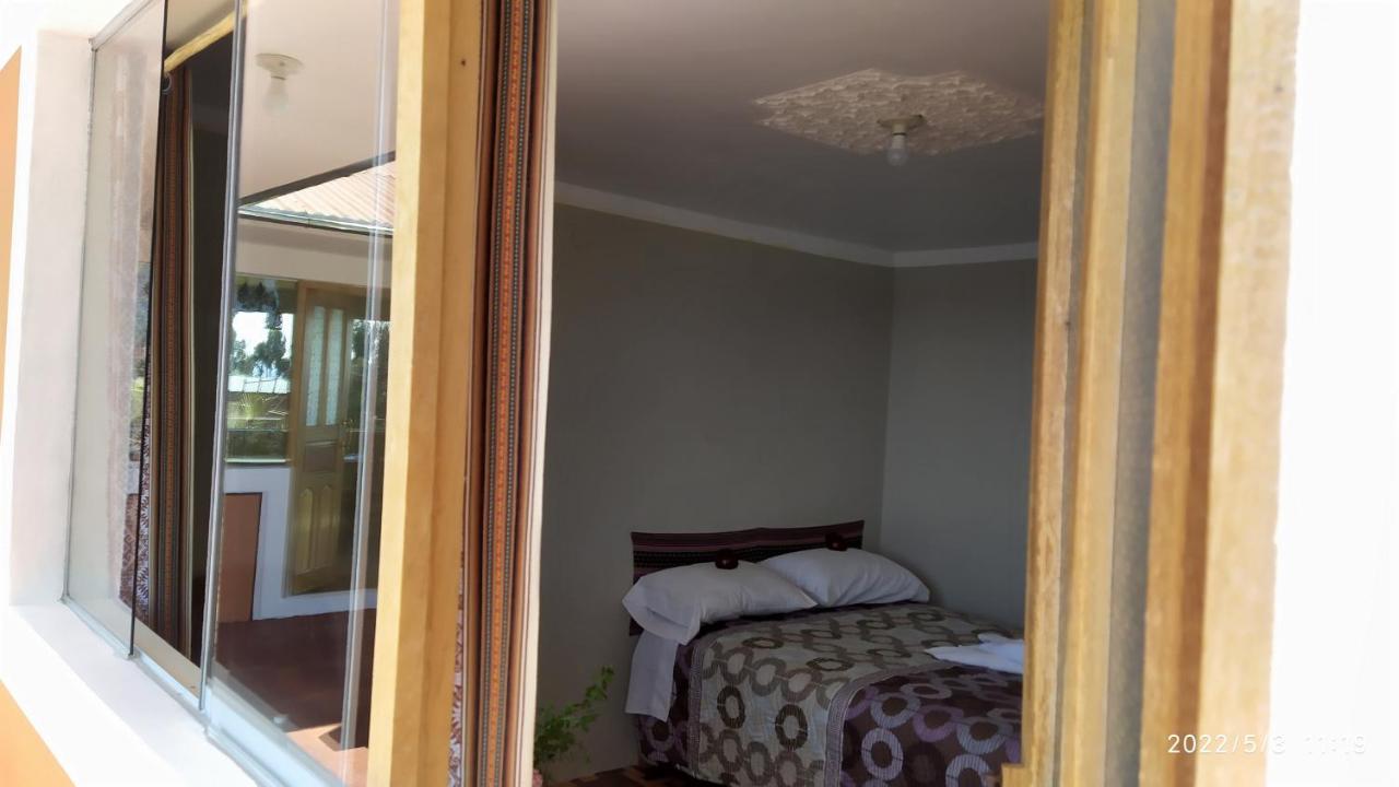 Tikawasi Homestay Comunidad Pueblo Isla Amantani José Luis Ocosuyo Extérieur photo